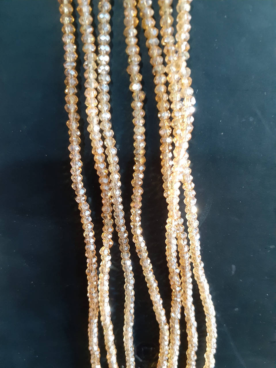 

Бусины "рондель" стекло d-3x2мм(+-) L-38см(+-)