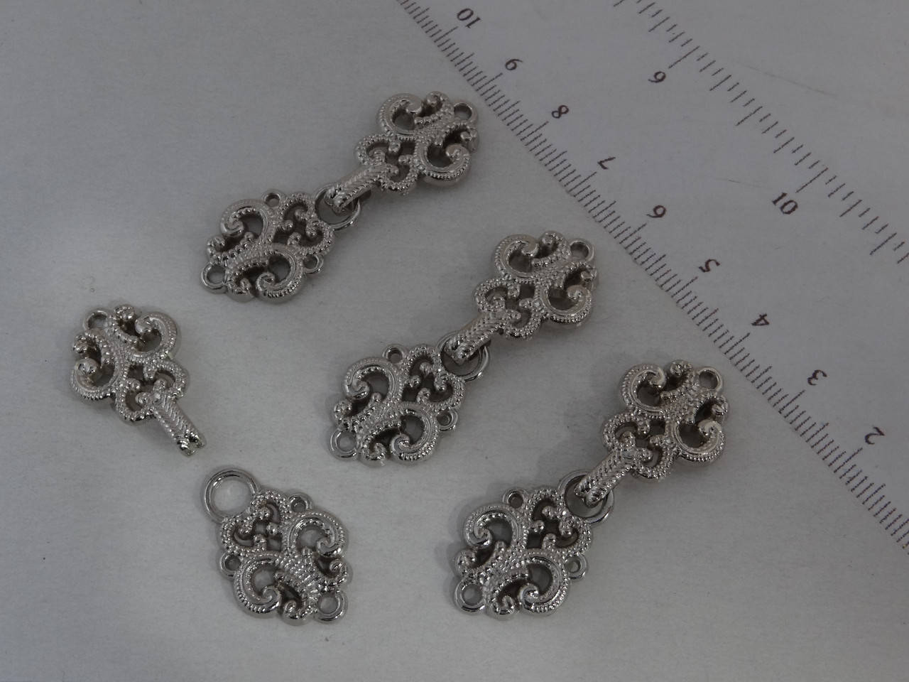 

Застежка декоративная 012 silver black gold никель