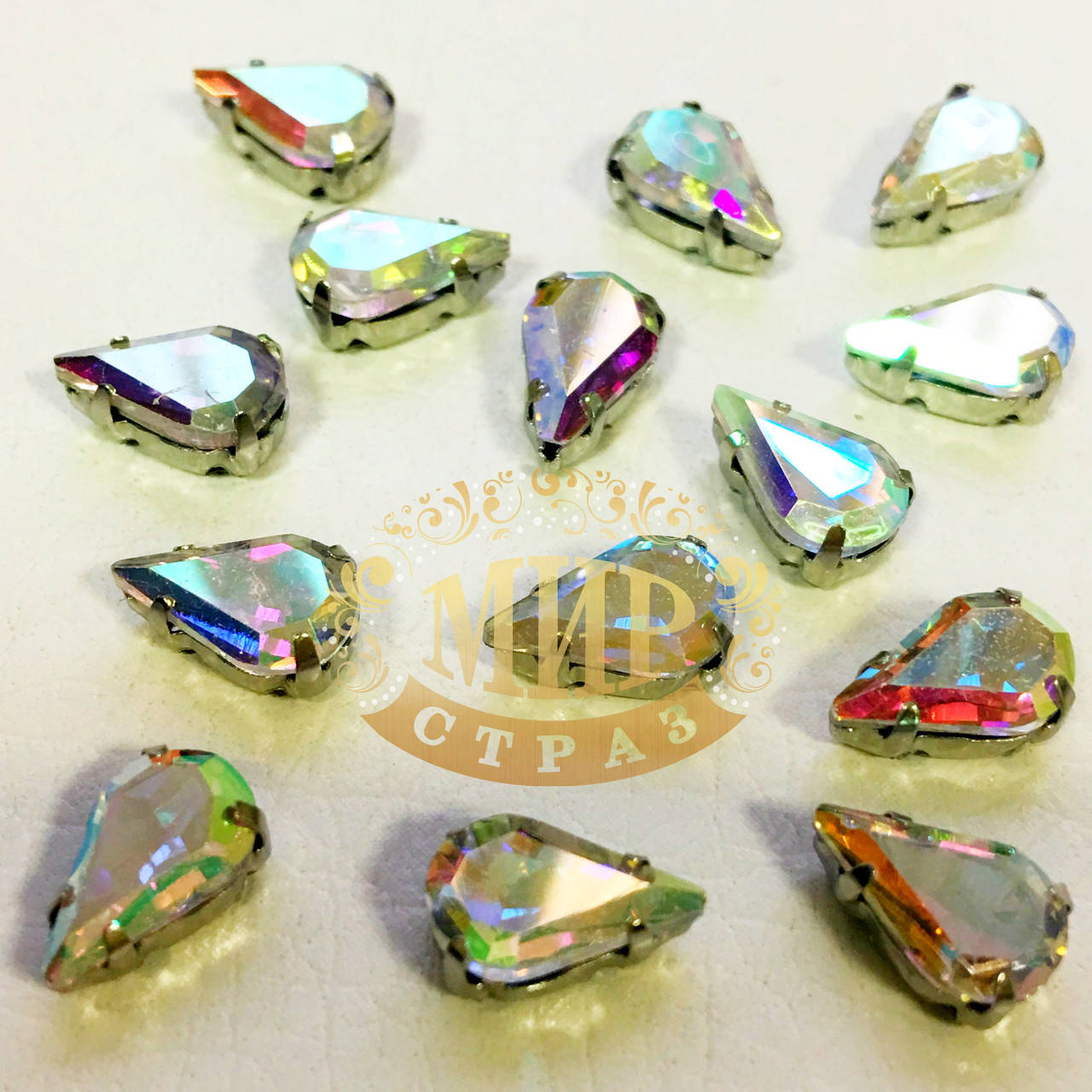 

Cтразы в цапах Капля, Размер 8x13, Цвет Crystal АВ (хамелеоны)