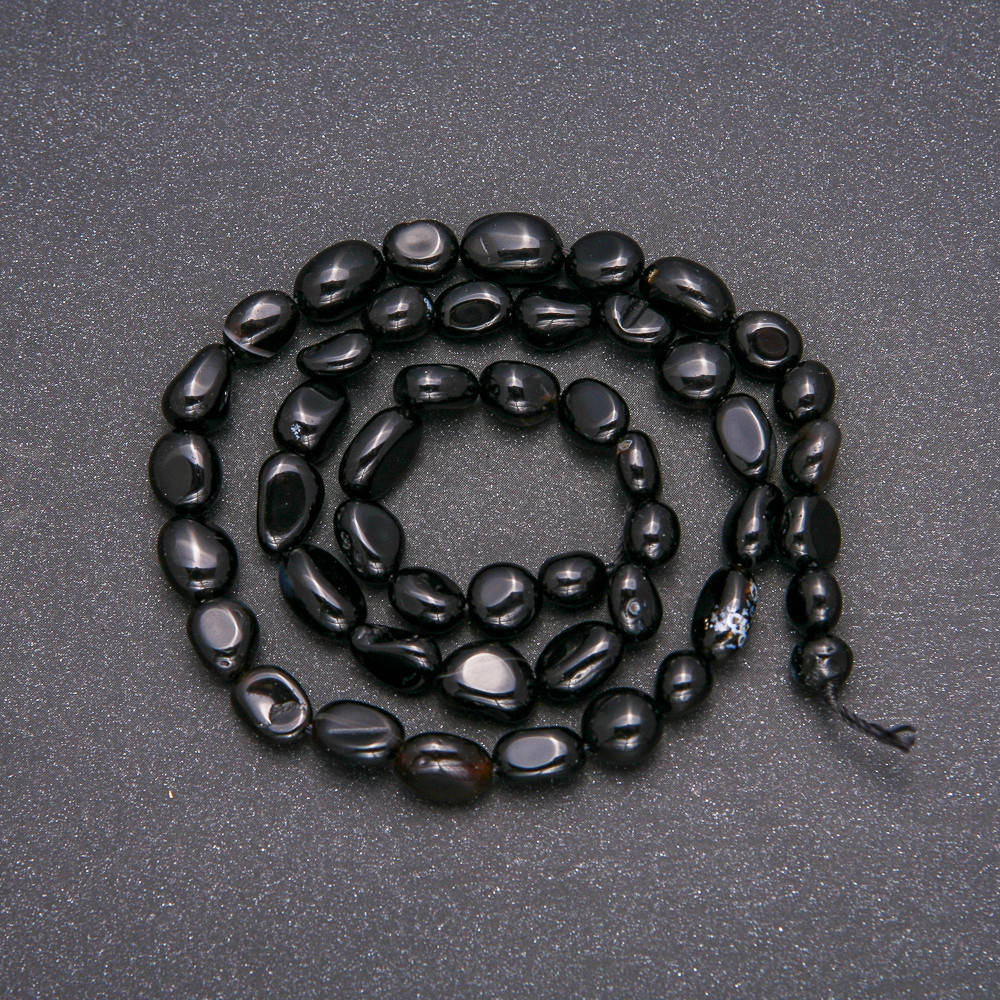 

Бусины из натурального камня Агат галтовка d-7х9 (+-)мм L-38см