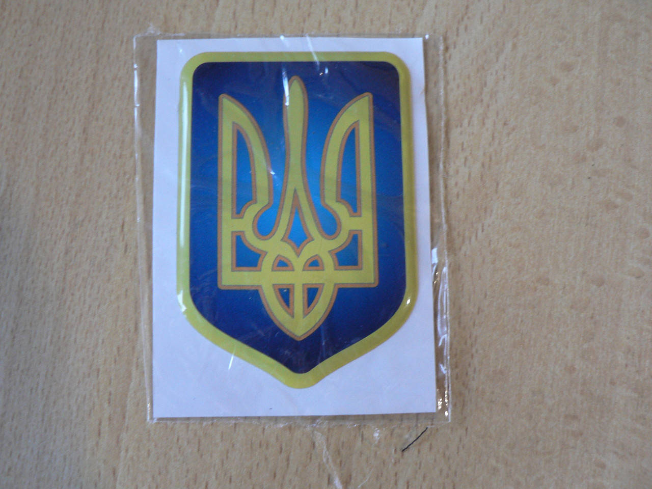 

Наклейка s силиконовая Герб сине желтый 50х70х1.1мм темная сплошная Украины трезуб тризуб