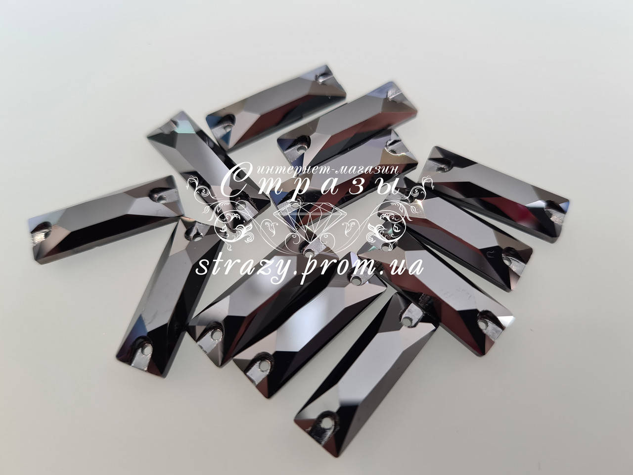 

Стразы пришивные Lux Багет 6*18мм. Hematite