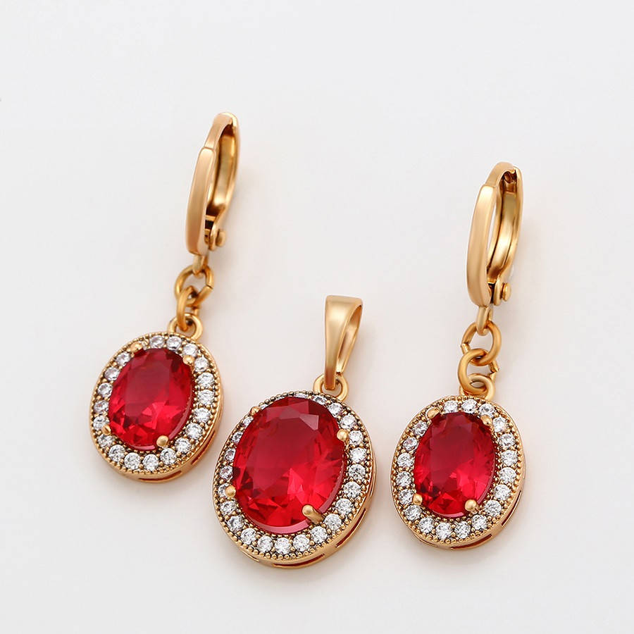 

Набор серьги и кулон с красными овальными кристаллами позолота 18к. Xuping.