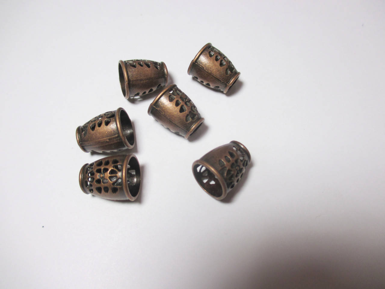 

Обіймач для шнурів 14мм, метал колір мідь, 2 шт