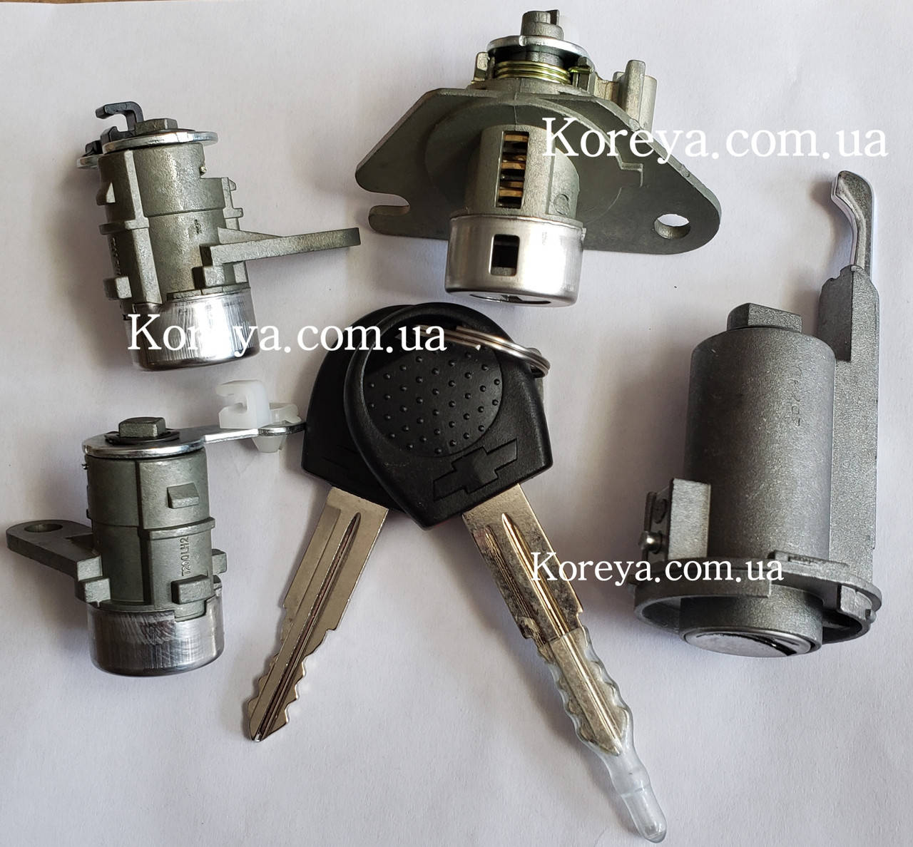 

Замок зажигания +комплект личинок Aveo T255 Т-200 Хетчбек 96585577 оригинал