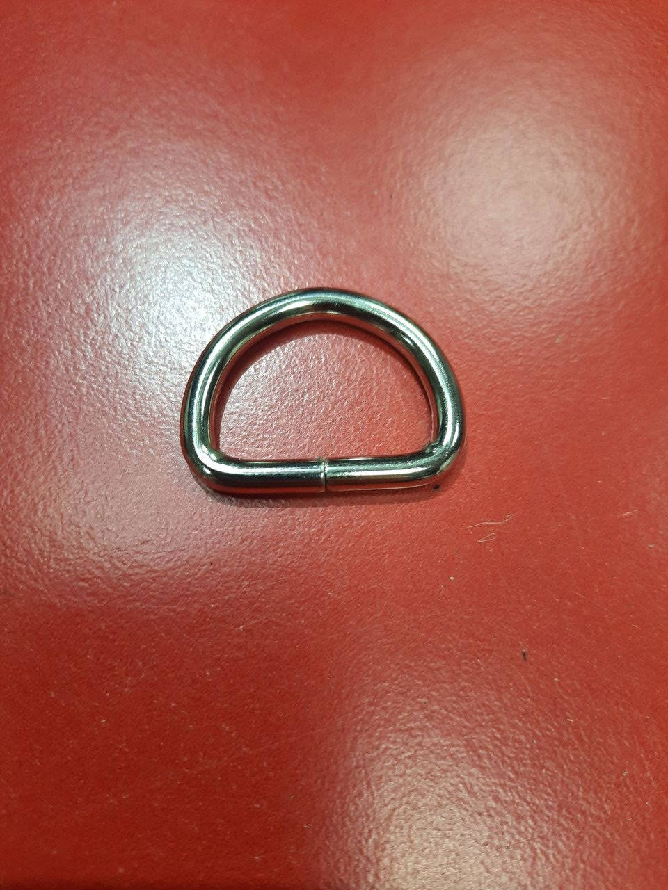 

Металлическое полукольцо никель (серебро). Под ленту 25мм.