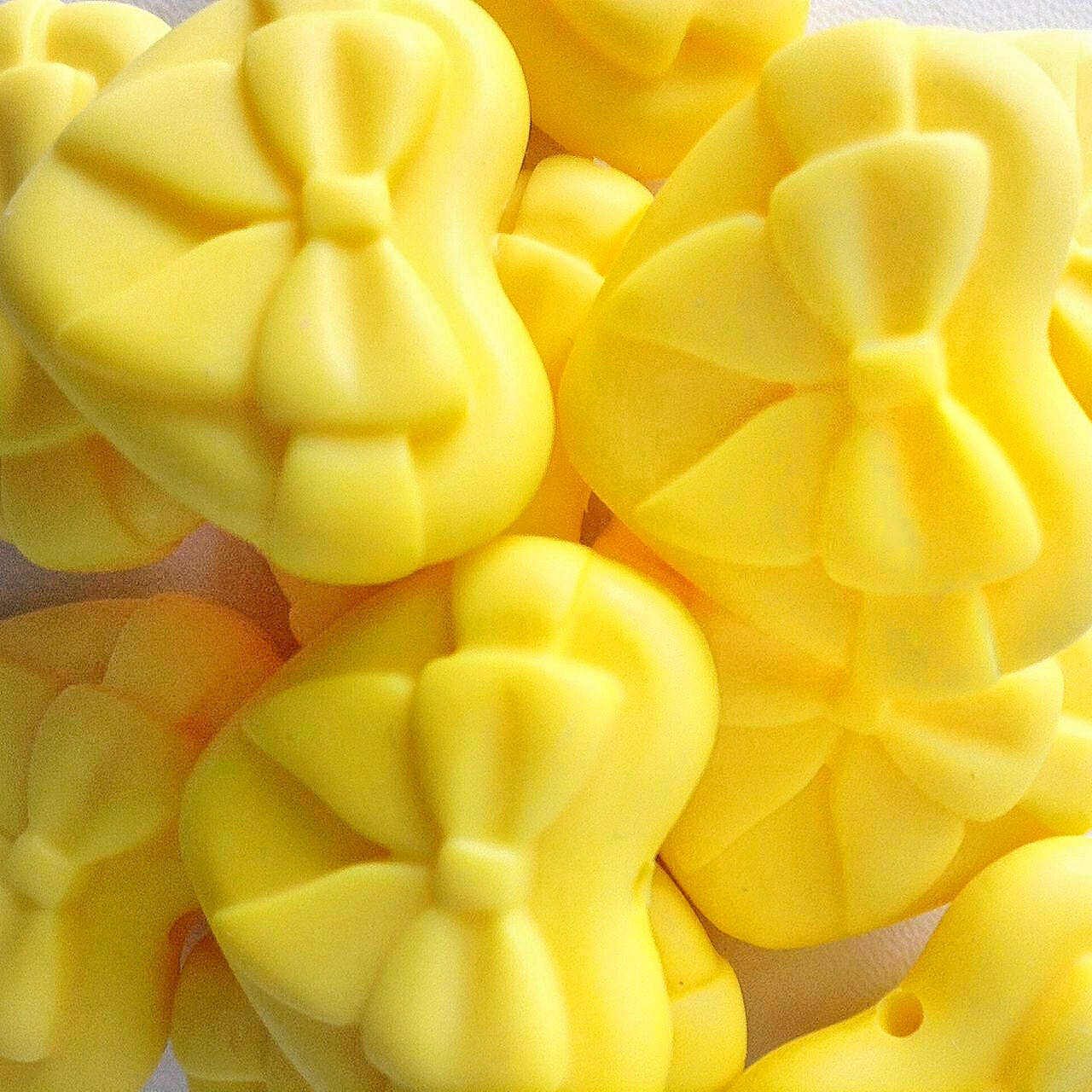 

Сердце с бантиком бусина силиконовая Жёлтый