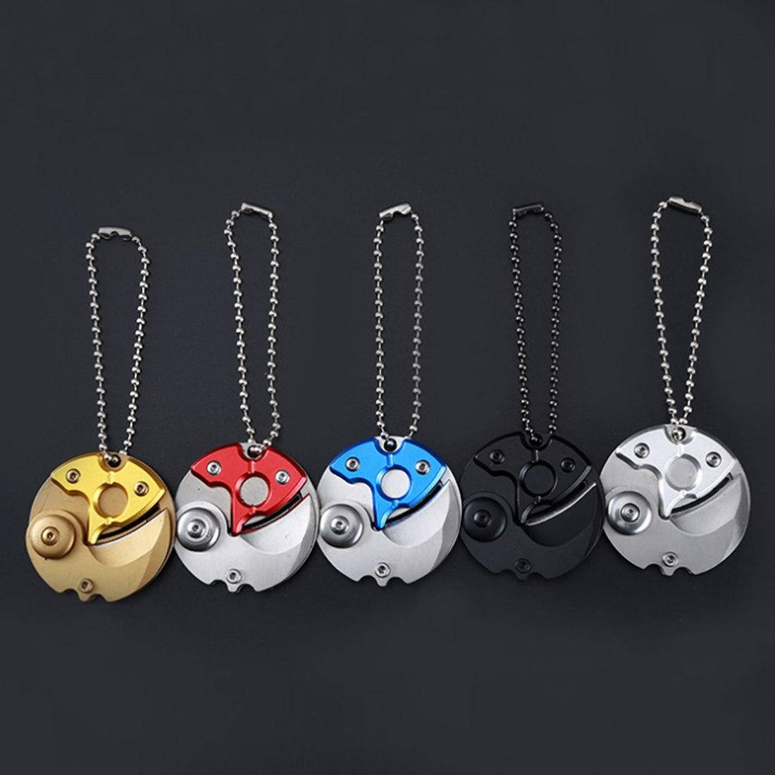 

Мини-нож (брелок). Монета нож.