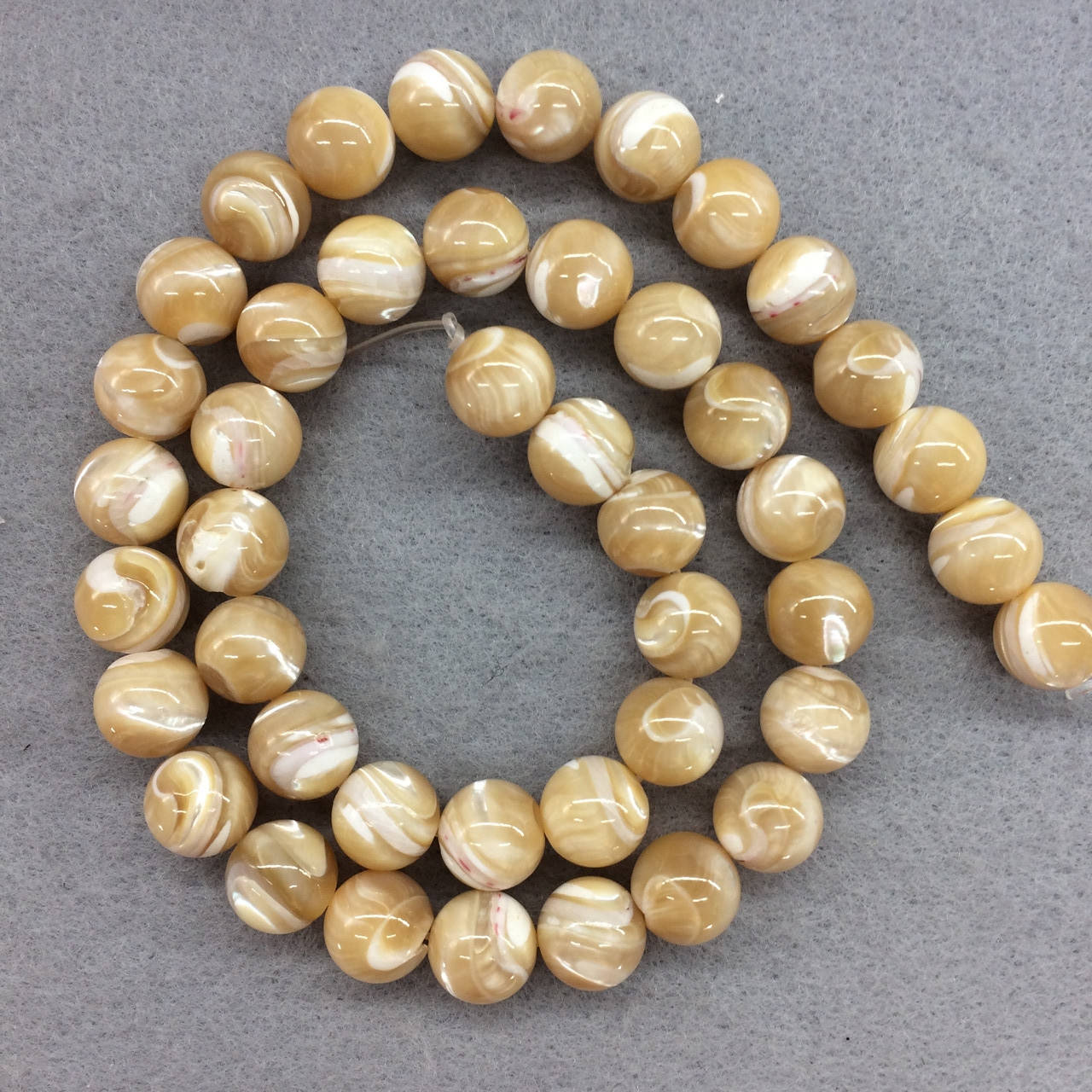 

Бусины на нитке натуральный Перламутр персиковый гладкий шарик d=9,5мм