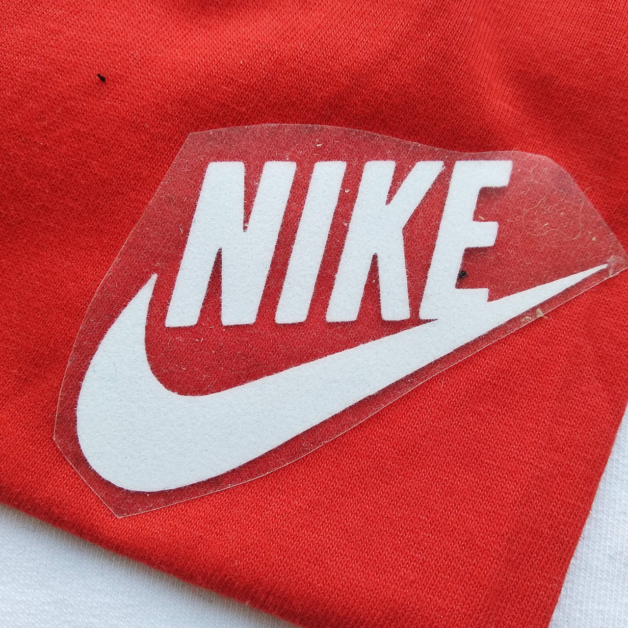 

Термотрансфер логотипом NIKE