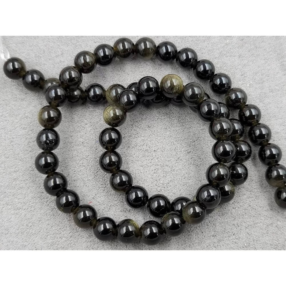 

Бусины Обсидиан золотой на нитке гладкий шарик d-6мм(+-) L37см