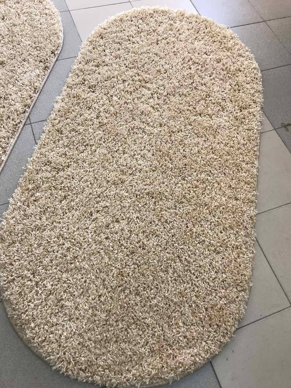 

Пушистsй овальный ковер Shaggy Турция 0,7 х 1,6 беж ближе к золотистому.