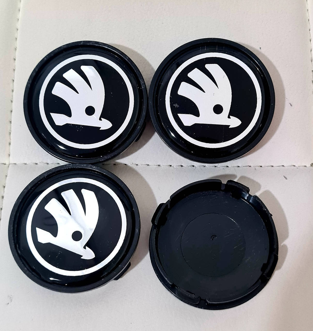 

Колпачки, заглушки на диски Skoda Шкода 60 мм / 56 мм черная нового образца силиконовые