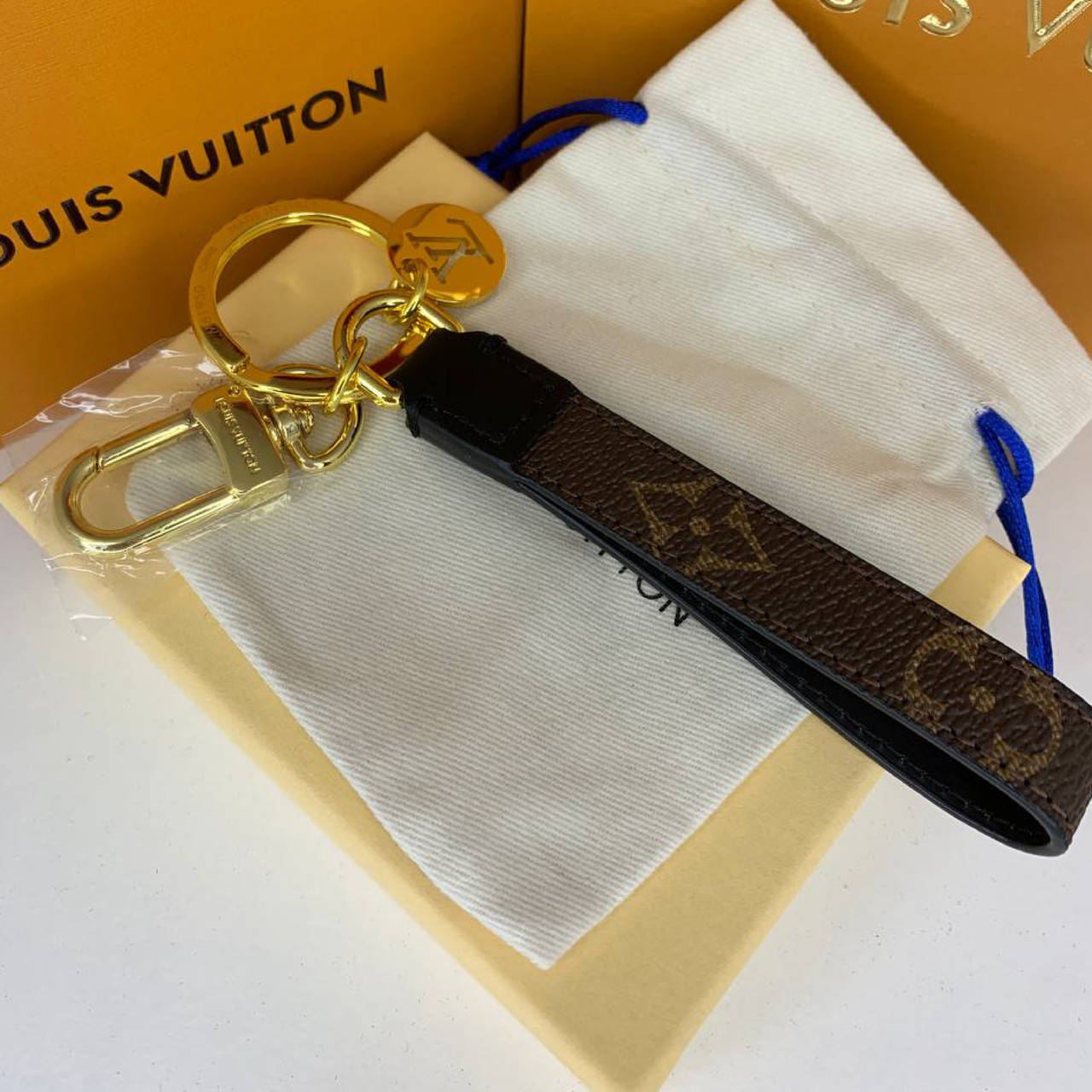 

Брелок Луи Виттон Louis Vuitton петля коричневого цвета, Коричневый