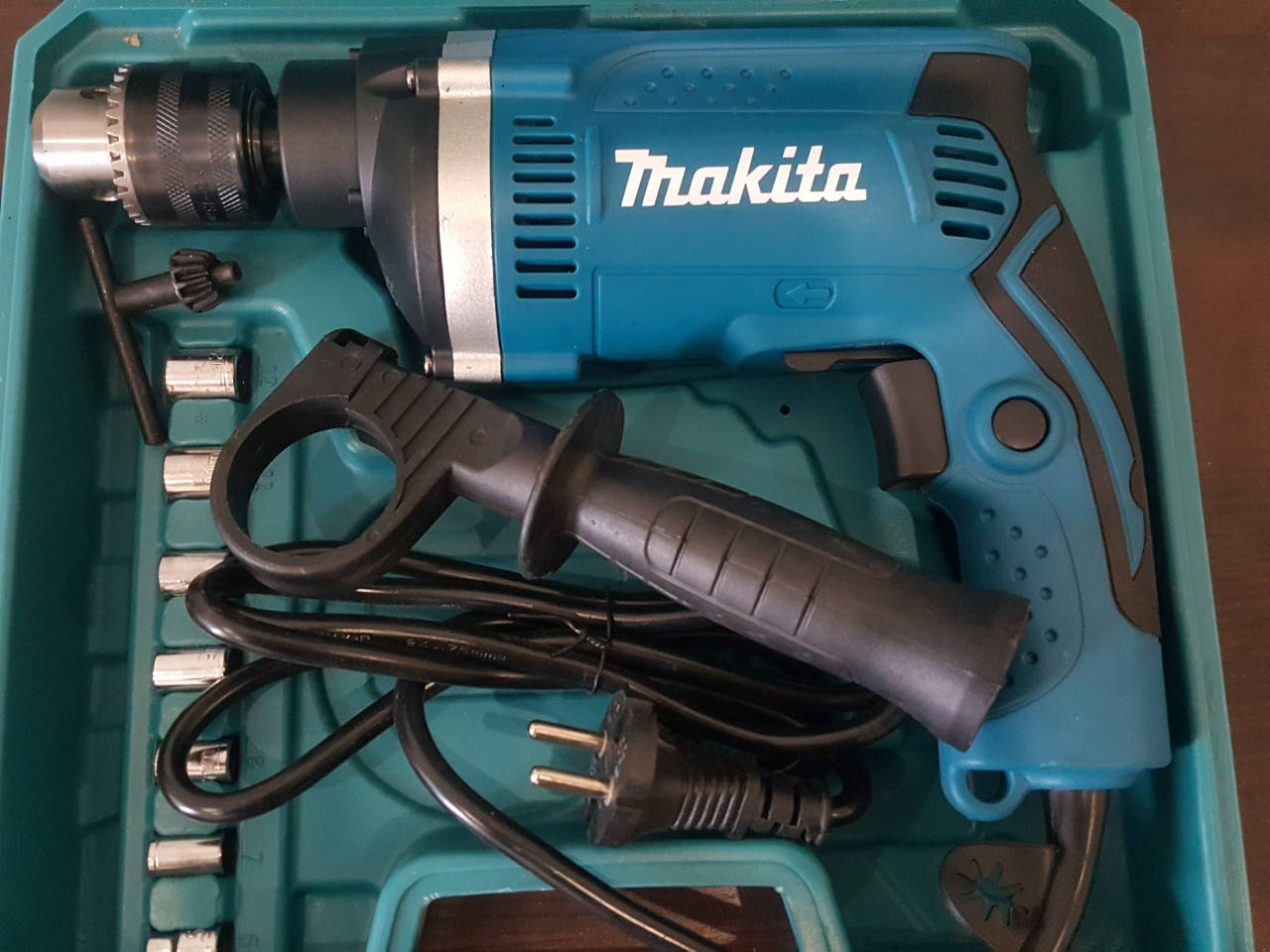 

Дрель электрическая ударная Makita HP1630K