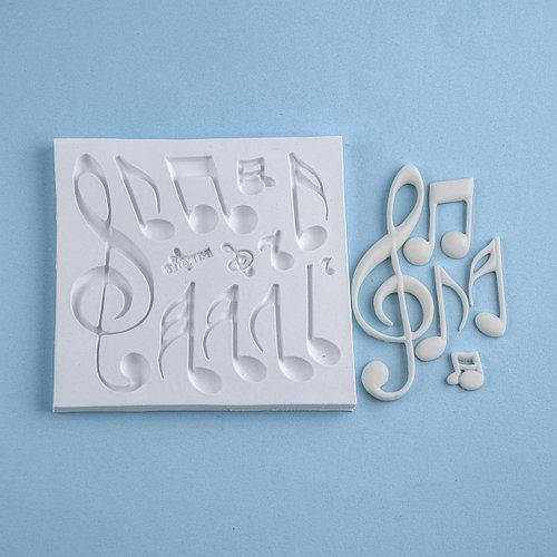 

Молд кондитерський силіконовий для мастики Ноти великі