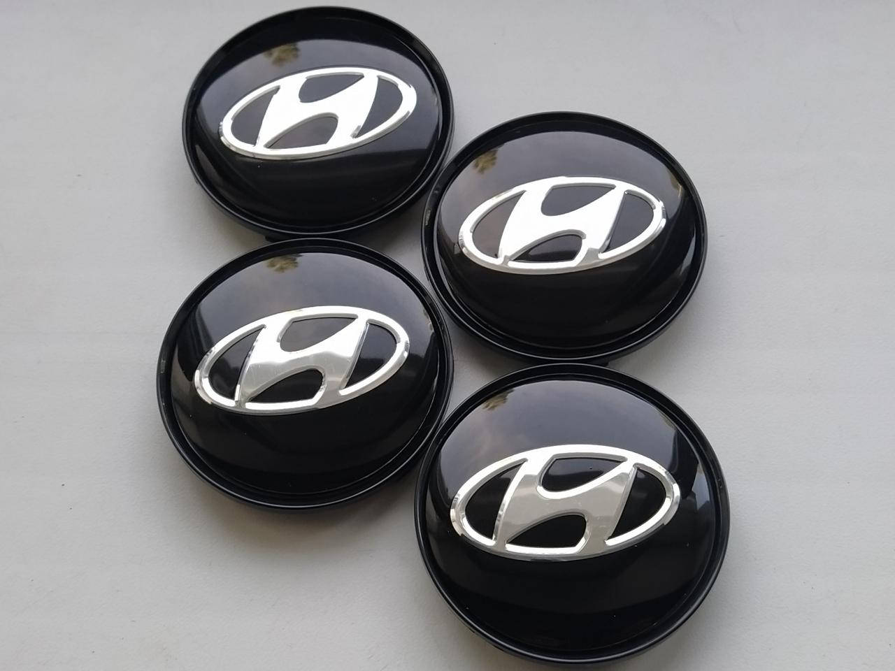

Колпачки заглушки в литые диски Hyundai 63/58/8 мм. Черная основа