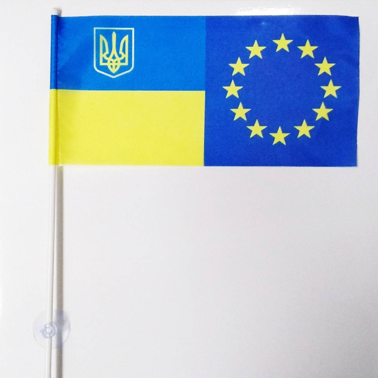 

Флажок (прапорець) Украина-Евросоюз в машину с присоской , полиэстер , 11 х 22 см.