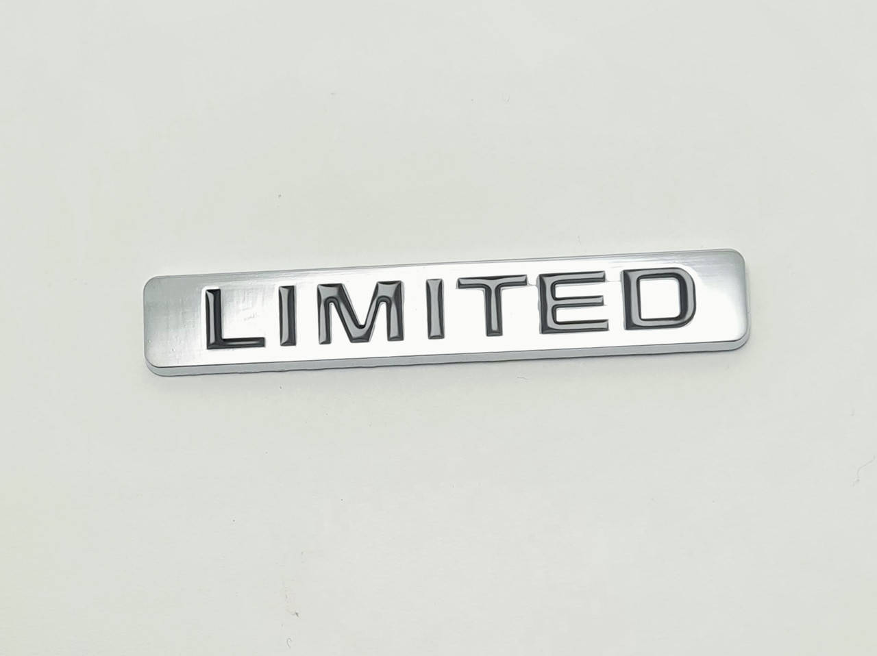 

Эмблема надпись багажника Limited