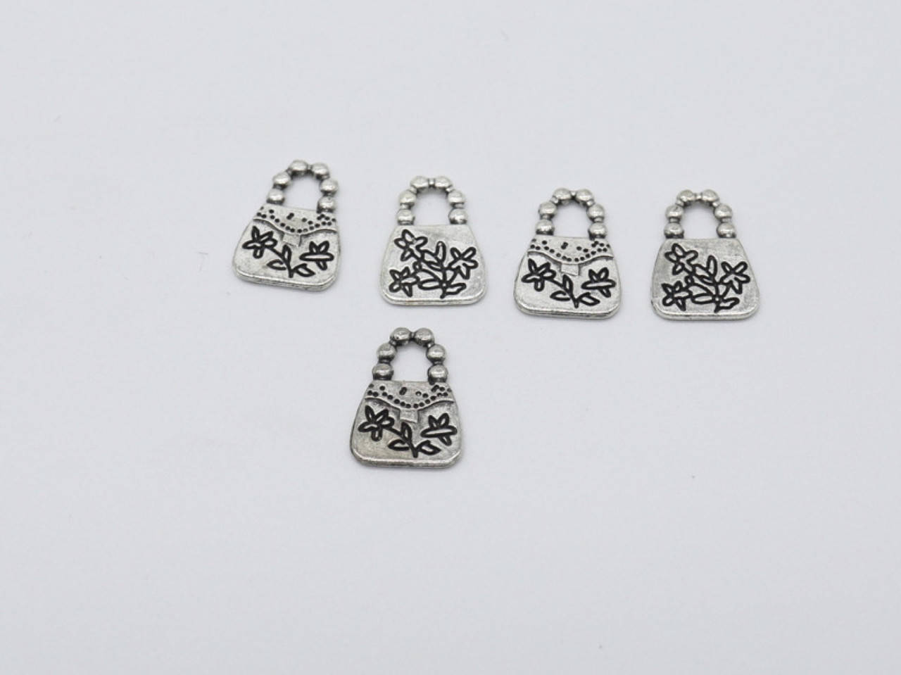 

Кулоны металлические. Сумочка. Цвет "античное серебро". 16х12мм