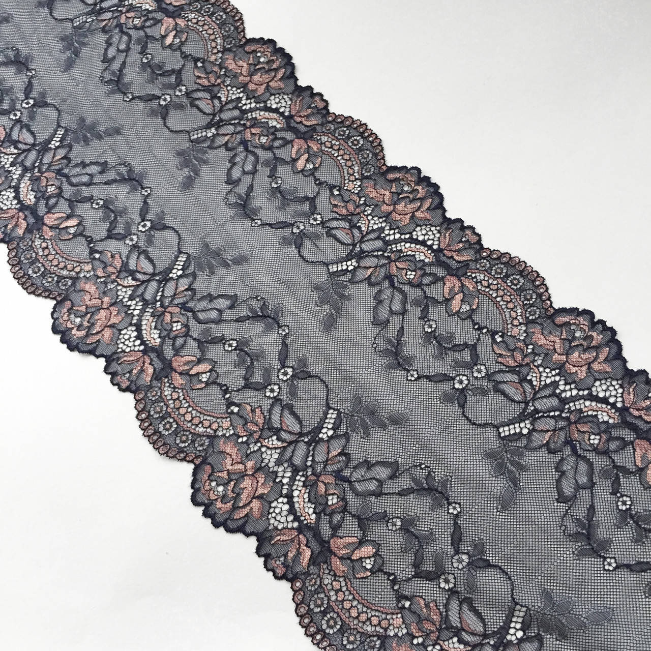 

Стрейчевое (эластичное) кружево темно-синего с розовым цветов шириной 22 см., Синий