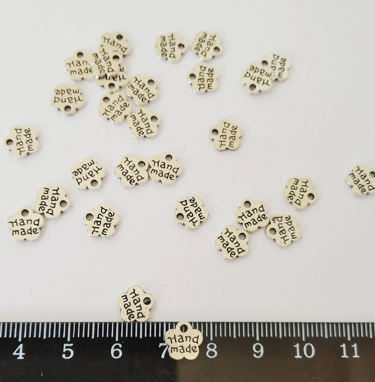 

Подвеска металлическая цветочек hand made 0.8 см