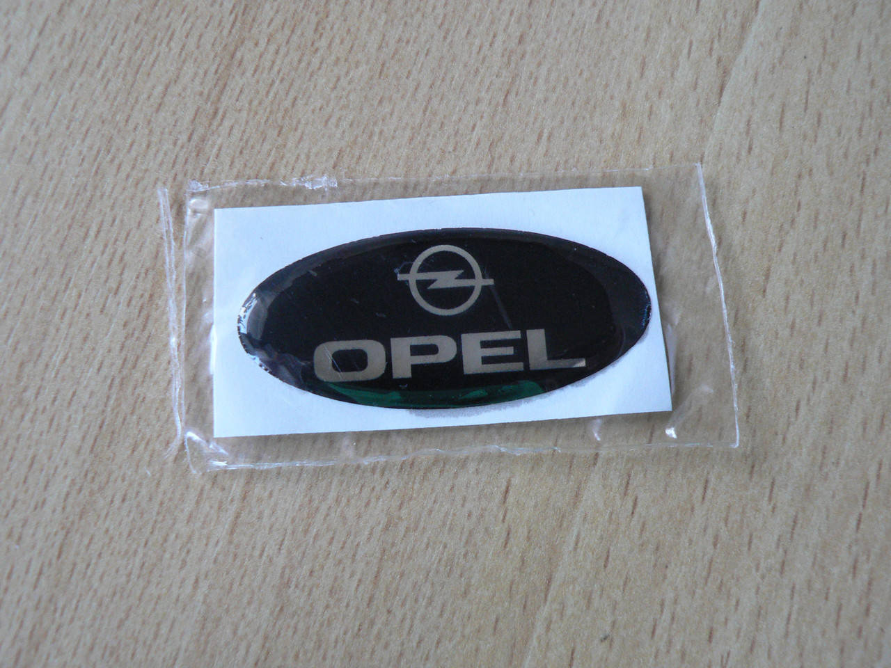 

Наклейка s надпись овал Opel 45х20х1.2мм силиконовая эмблема логотип марка бренд на авто Опель
