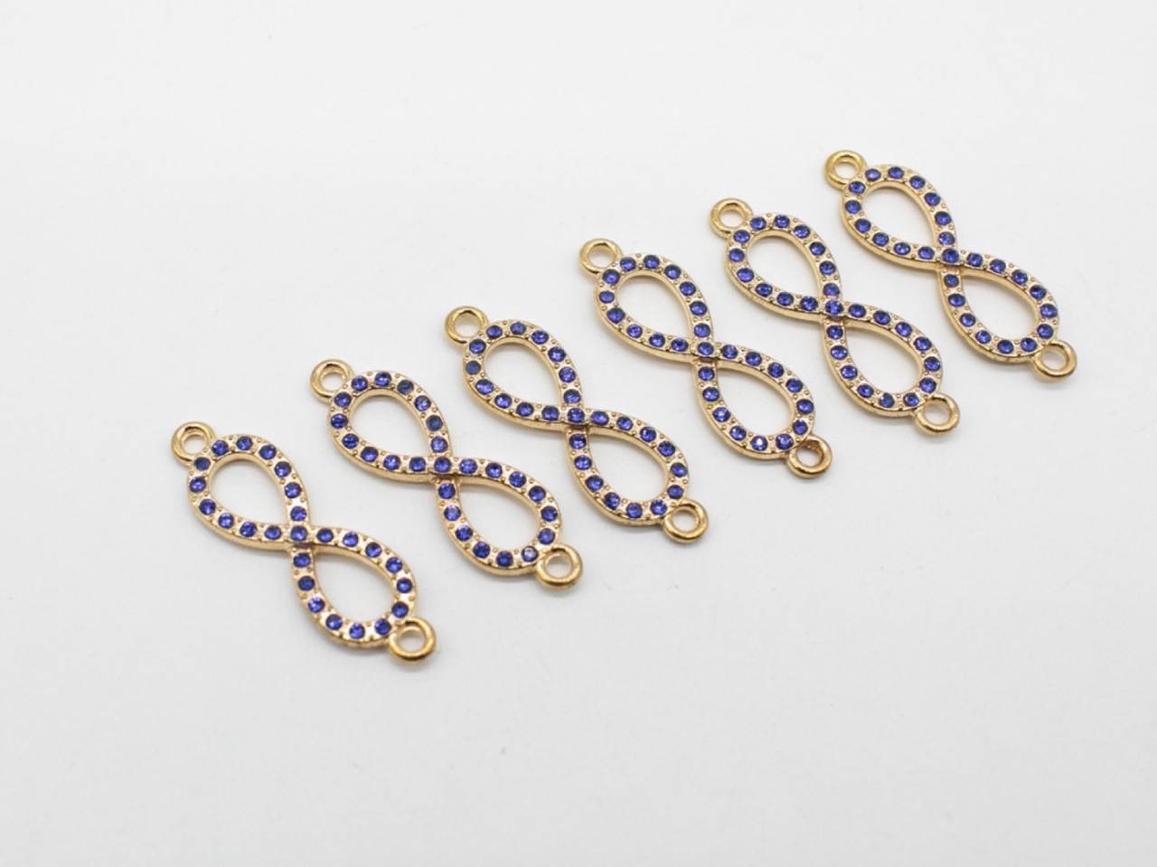 

Бесконечность. Цвет "золото". С камешком. 33мм