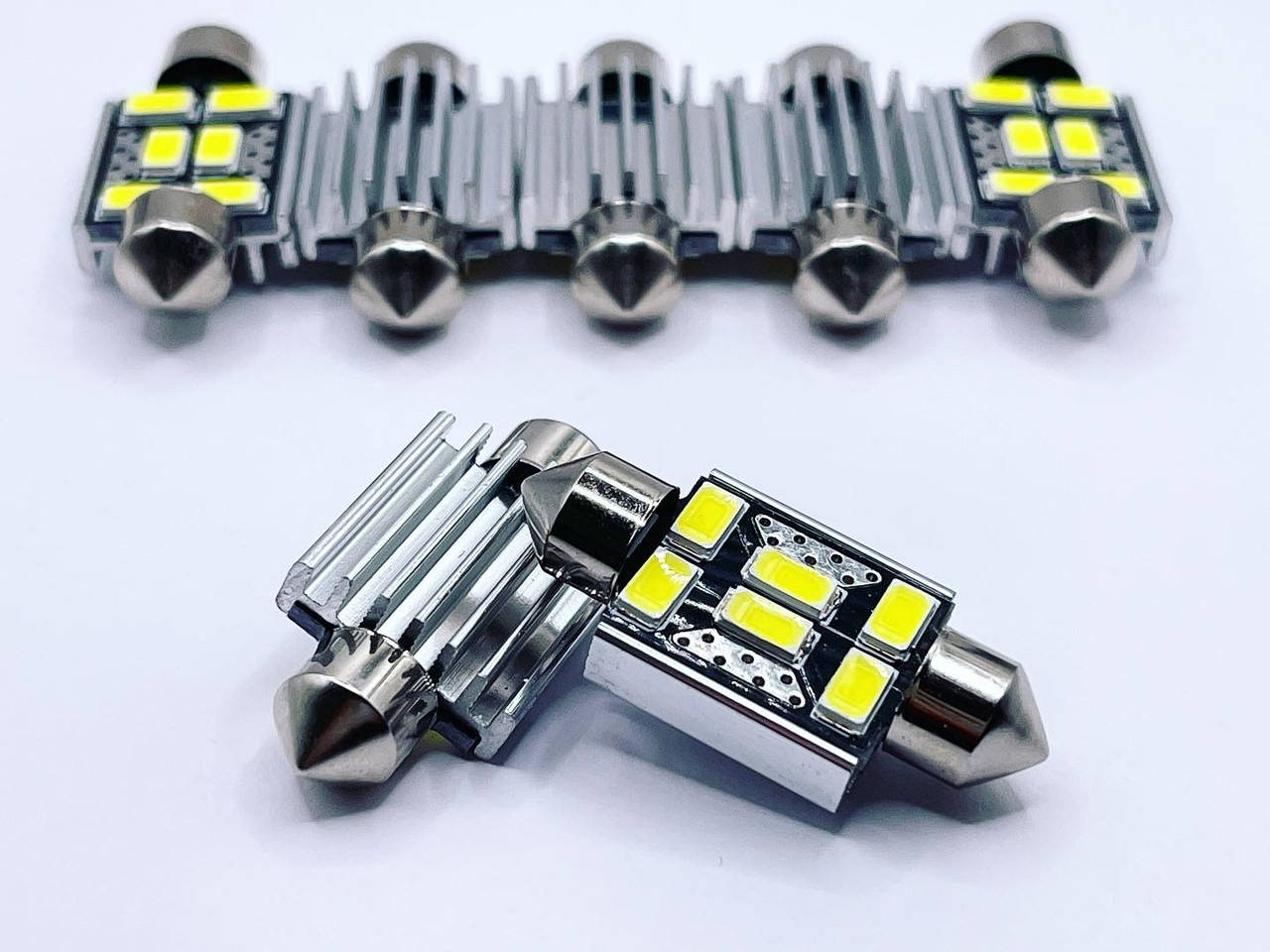 

Лампа SV8,5(C5W, C10W)AC 12V LED 6х5630 вентиляція white 36mm обманка