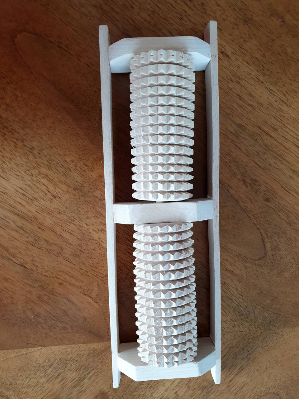 

Деревянный массажер для ног