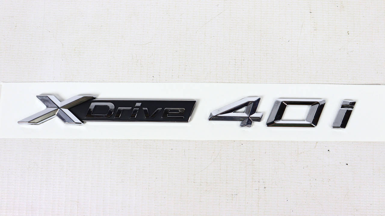 

Эмблема "XDrive 40i"