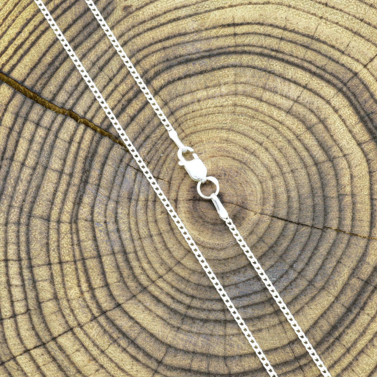 

Серебряная цепочка родированная Панцирная ширина 1 мм длина 45