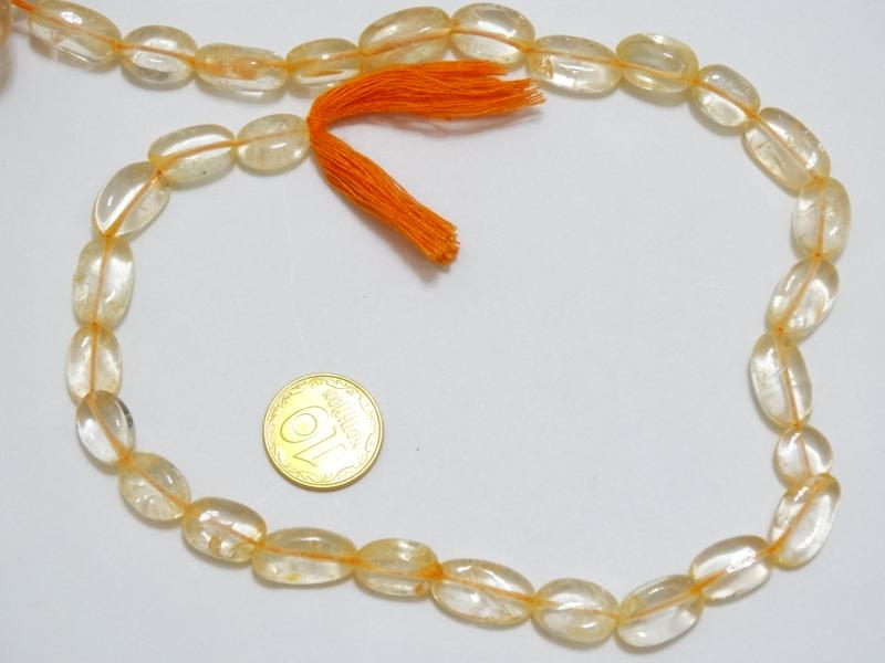 

Бусины на нитке натуральный камень Цитрин овал L=31см