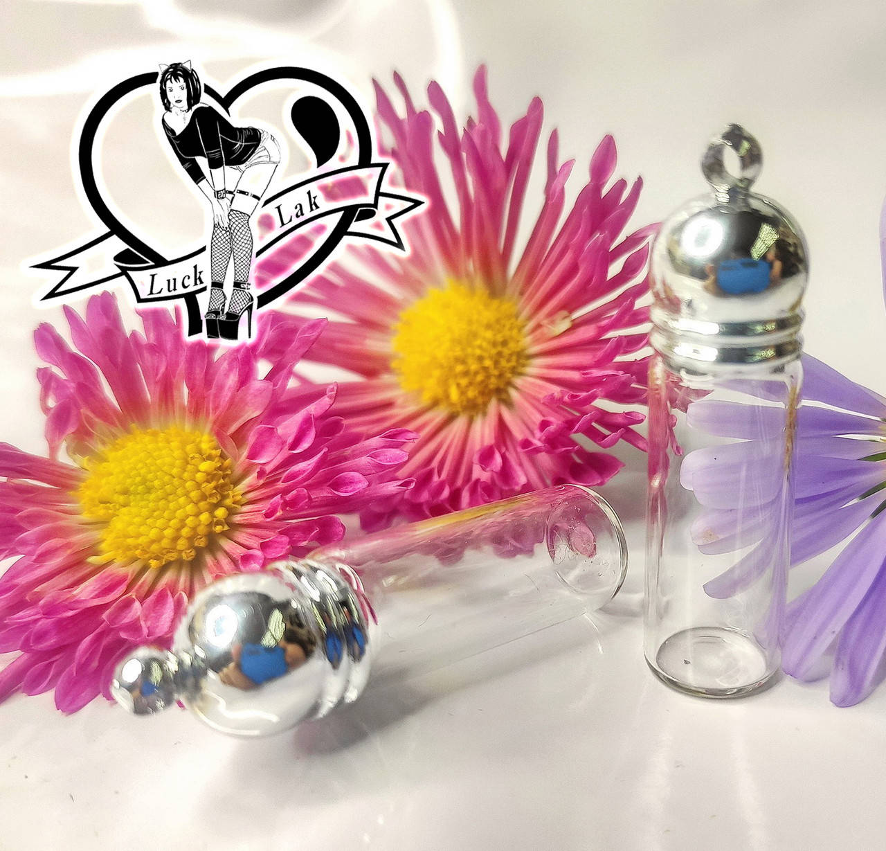 

Баночка стеклянная с подвеской 10х35 мм, 2 мл