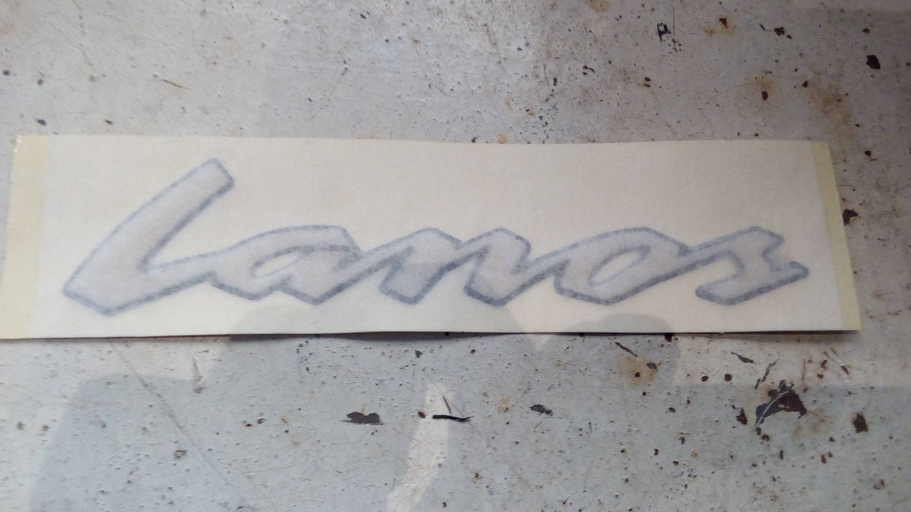 

Эмблема надпись LANOS (силикон)