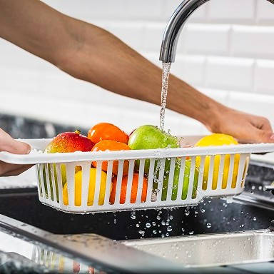 

Пластиковая сушилка для посуды и овощей на раковину