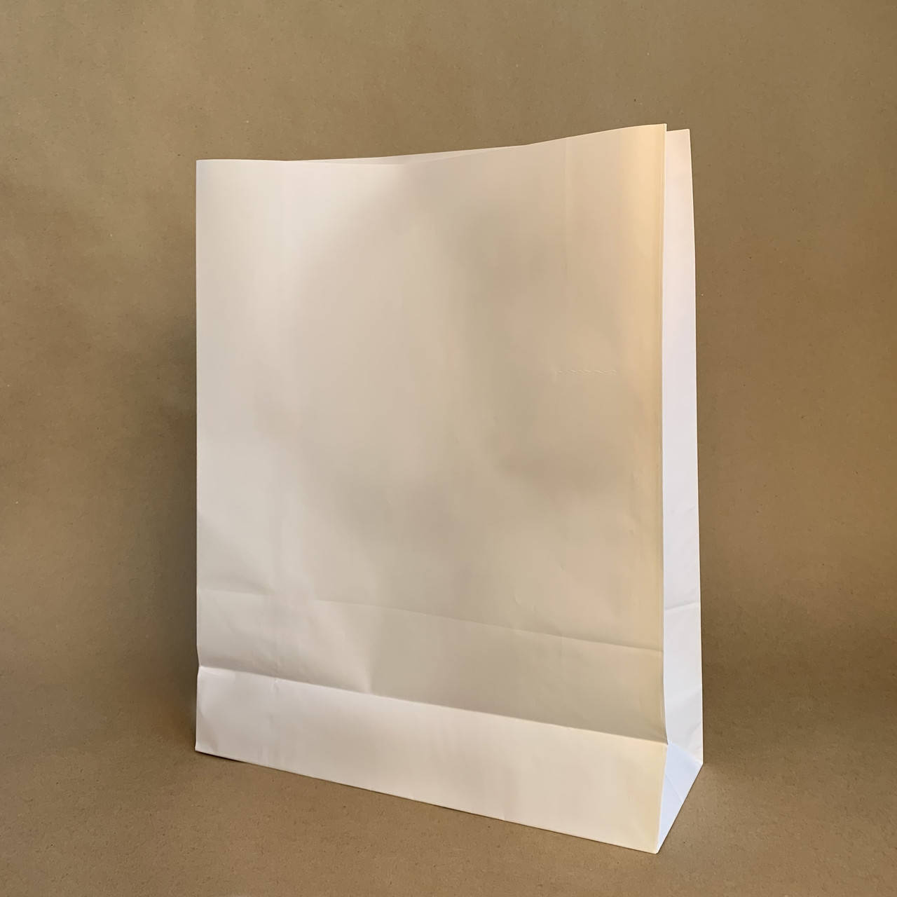 

Пакет бумажный белый крафт без ручек 320х150х420