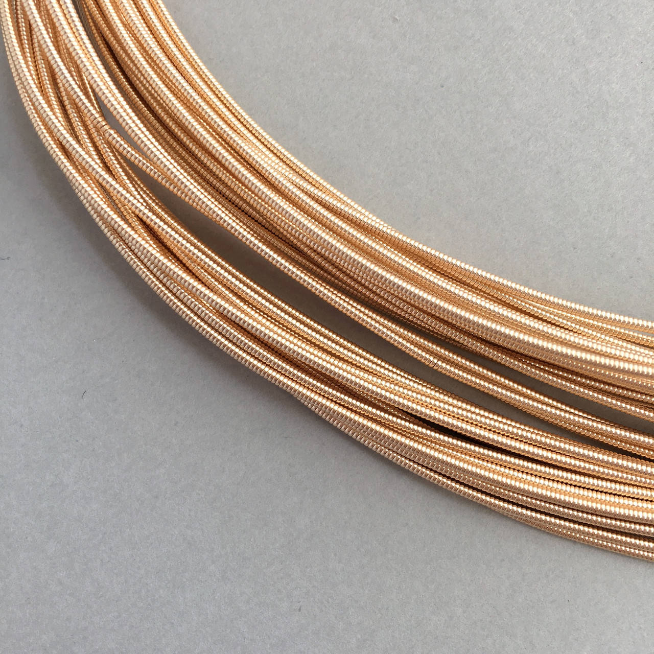 

Жорстка канітель 1 мм. Рожеве золото. 1 метр