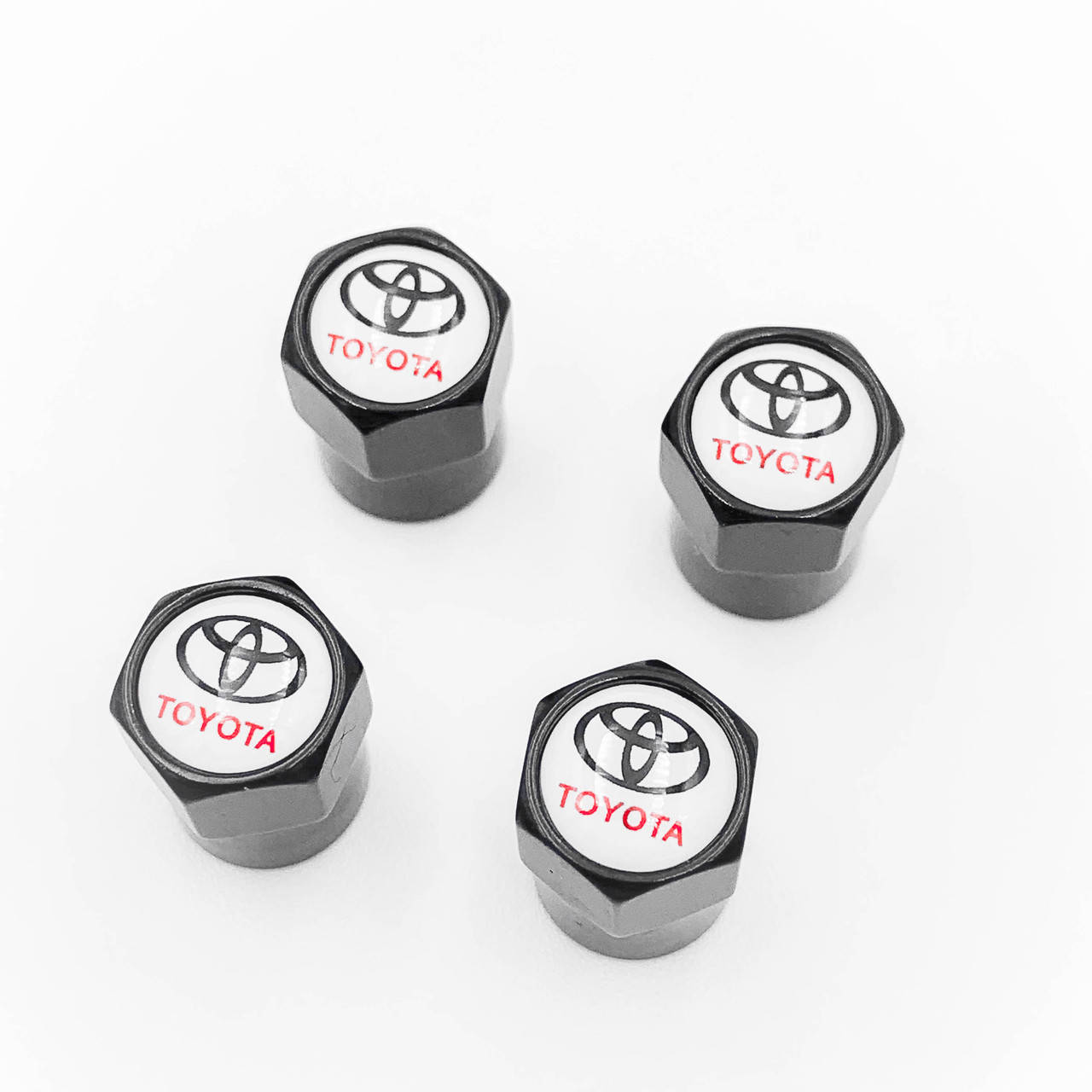 

Защитные колпачки на ниппеля Toyota 4 шт Белый фон с красной надписью Чёрные
