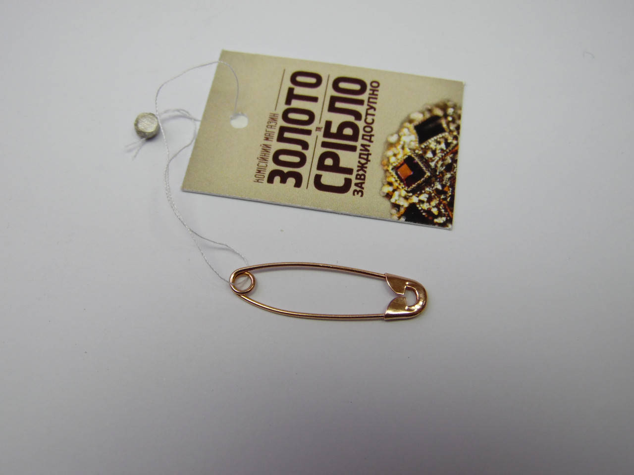 

Булавка золотая. Вес 0,61 гр.