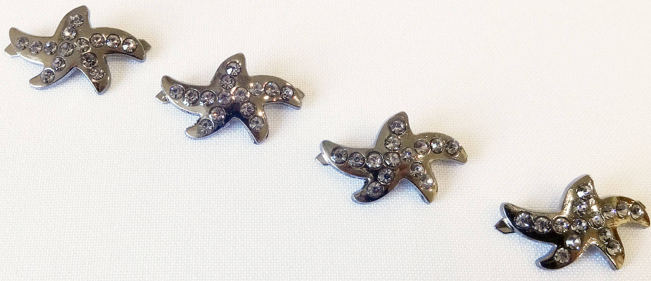 

Металлофурнитура на прокол черненная левая