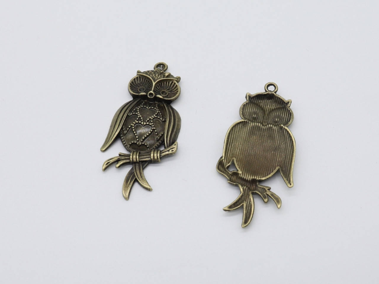 

Металлические накладки. Сова. Цвет "античная бронза". 66х31мм