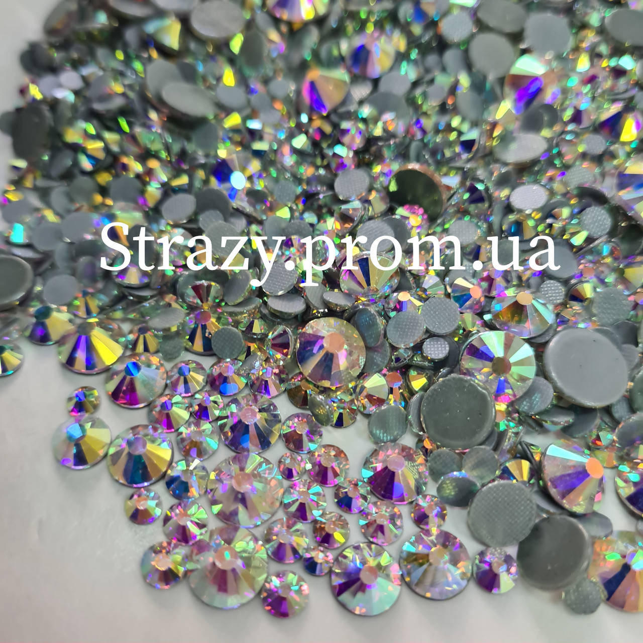 

Термо стразы Lux микс размеров ss12-ss40 Crystal AB 1440шт