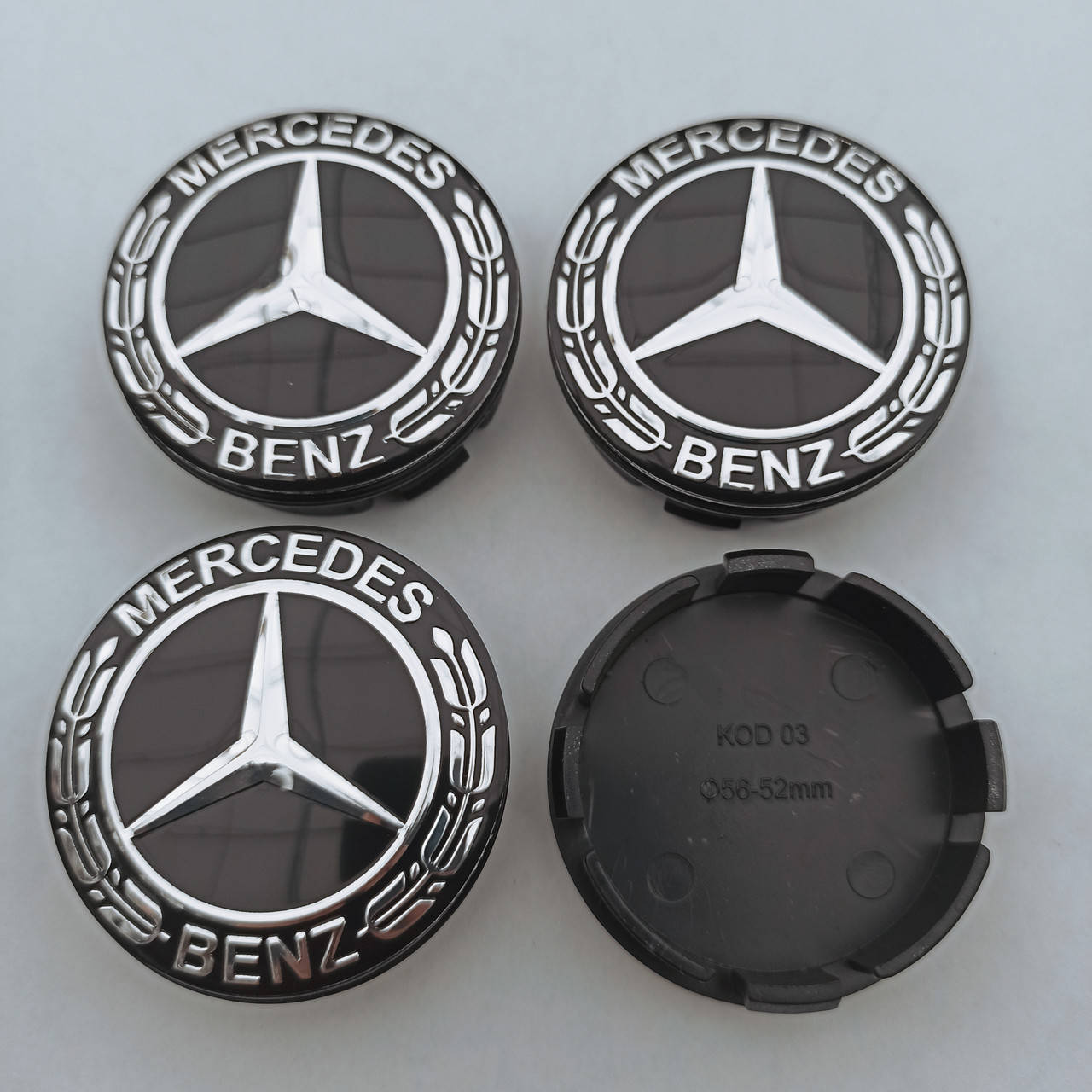 

Колпачки в диск Mercedes Benz 52-56 мм черные