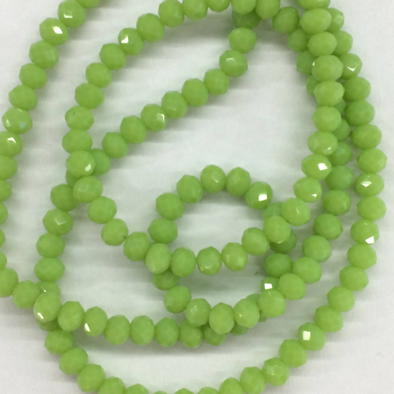 

Бусины на нитке Стекло рондель d=4мм цвет травяной матовый (~150 бусин на нитке)