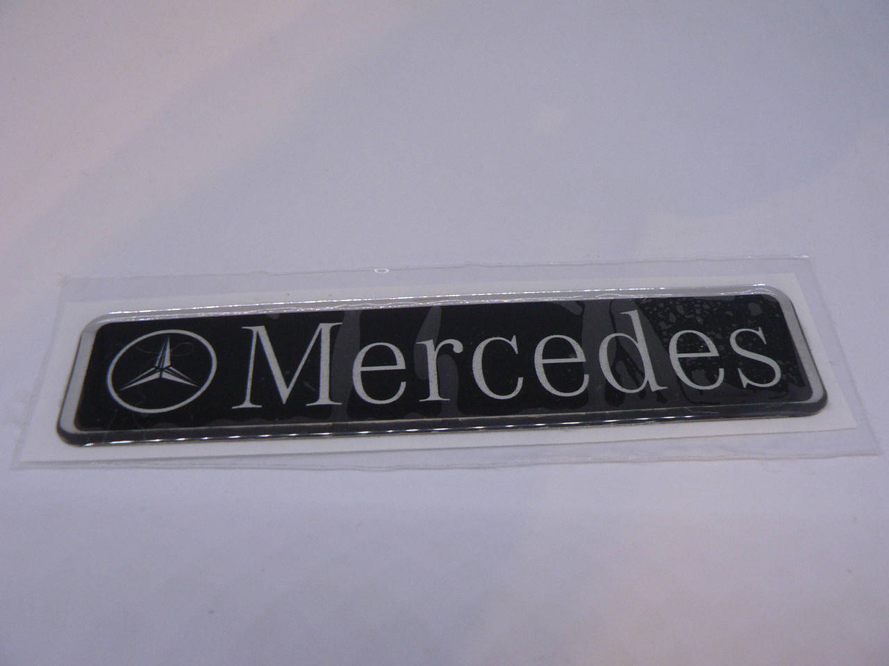 

Наклейка s надпись Mercedes100х25х1.2мм силиконовая на авто эмблема Мерседес