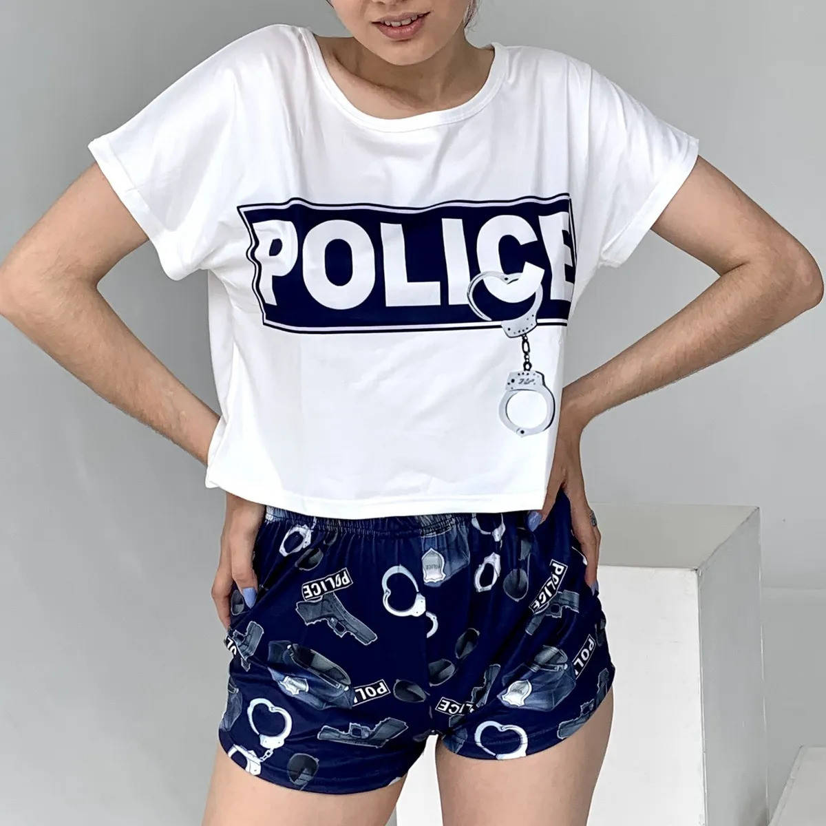 

Женская пижама укороченная футболка+шорты (р.42-50) с принтом Police 46/48, L