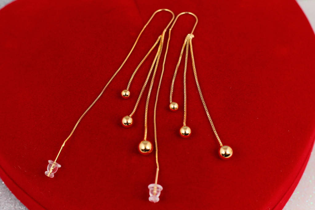 

Серьги продевки Xuping Jewelry три шарика на цепочках разной длины 9 см золотистые