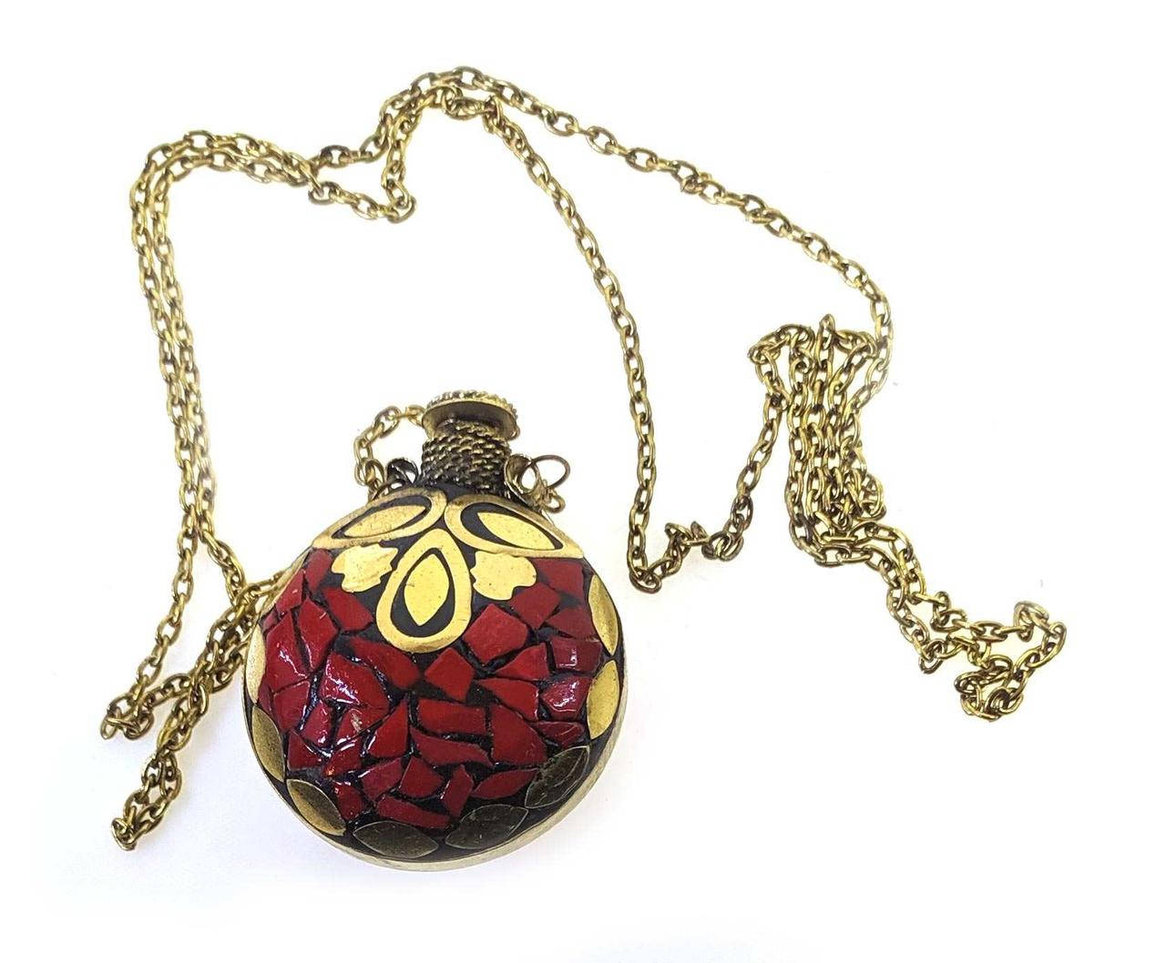 

Аромакулон бронзовый инкрустирован красными камнями 5х4х2см