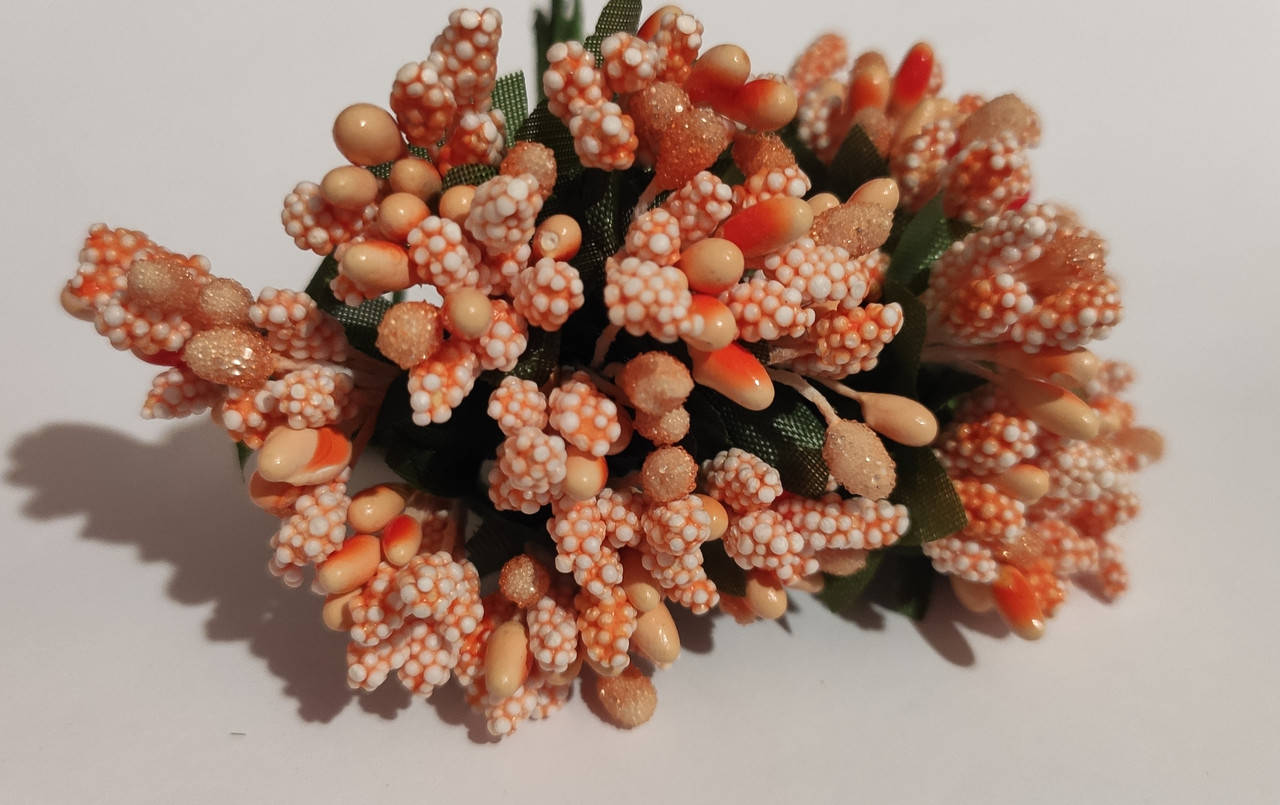 

Букетик с декоративными цветочками и тычинками . Размер 8.5 см , цвет персиковый